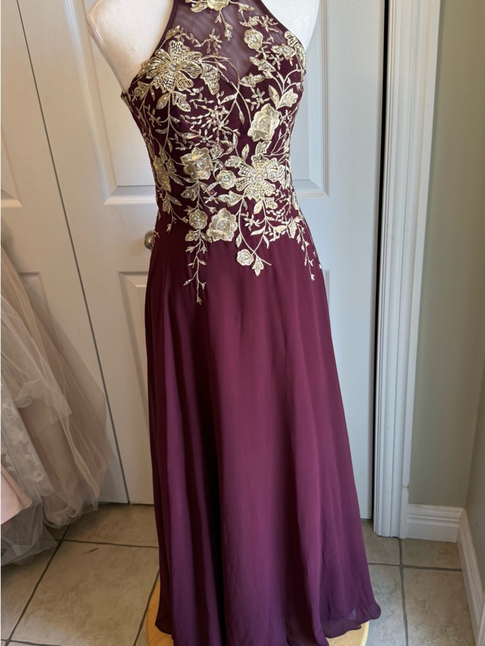 Betsy & Adam Wine Halter Gown with Gold Floral Appliqué